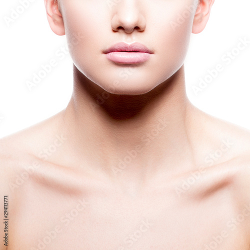 Lips, part of beauty face of young woman with perfect skin, nude natural make-up. Body care skincare facial treatment concept