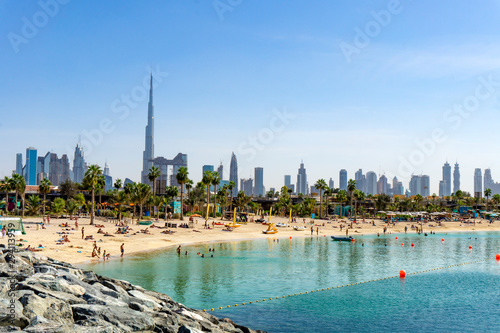 Photography Beach in Dubai with people and skyscapers in the background