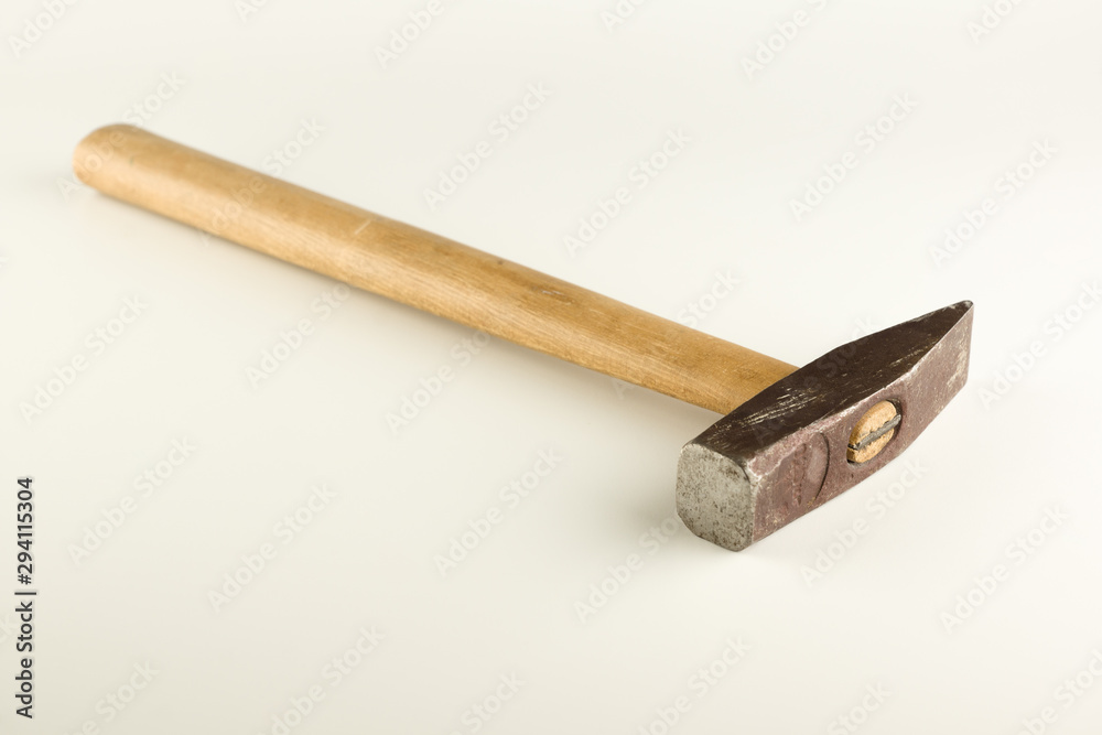 hammer with wooden handle isolated on a white background