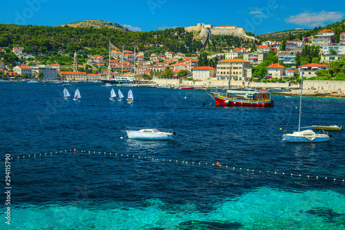 Adriatic waterfront with fishing boats and historic buildings, Hvar, Croatia