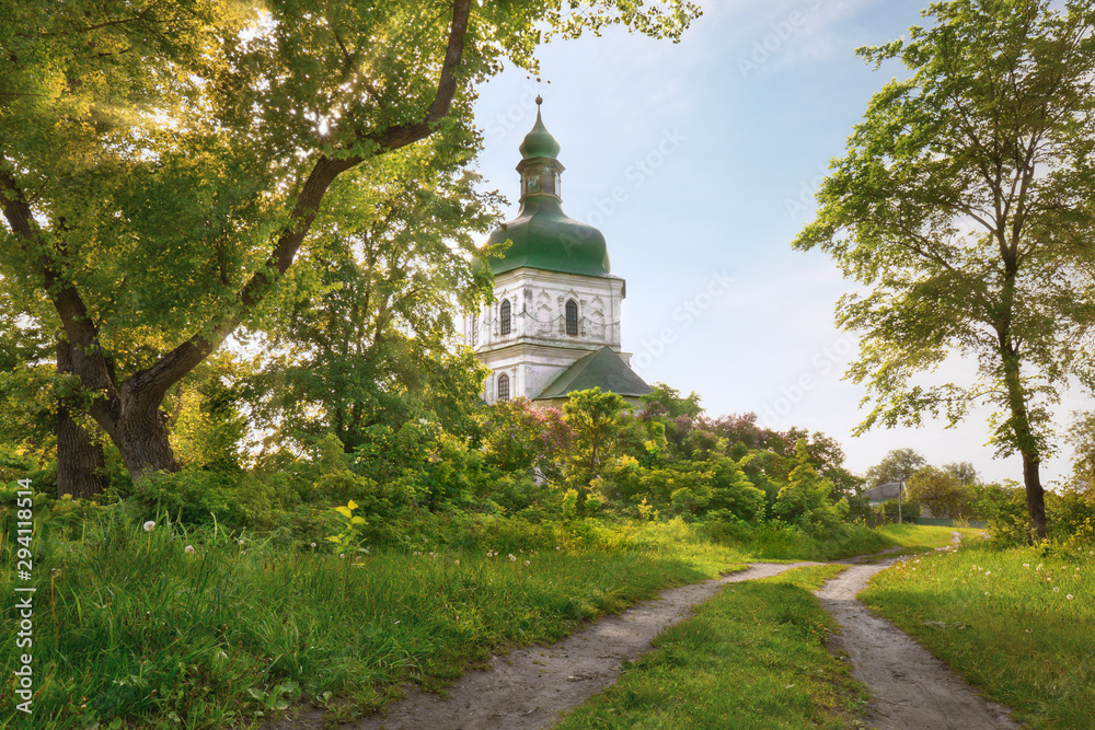 Country road to old church, historic outdoor background Country road to old church, historic outdoor background