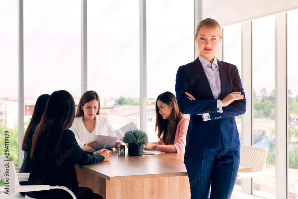 Fototapeta premium Business people or colleague standing posing while meeting and talking in office, professional executives coworkers discussion and brainstorming