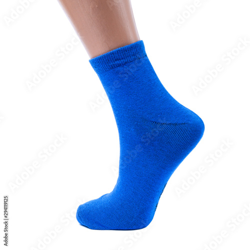 Obraz na płótnie blue socks on an isolated white background with funny cartoon character on it w salonie