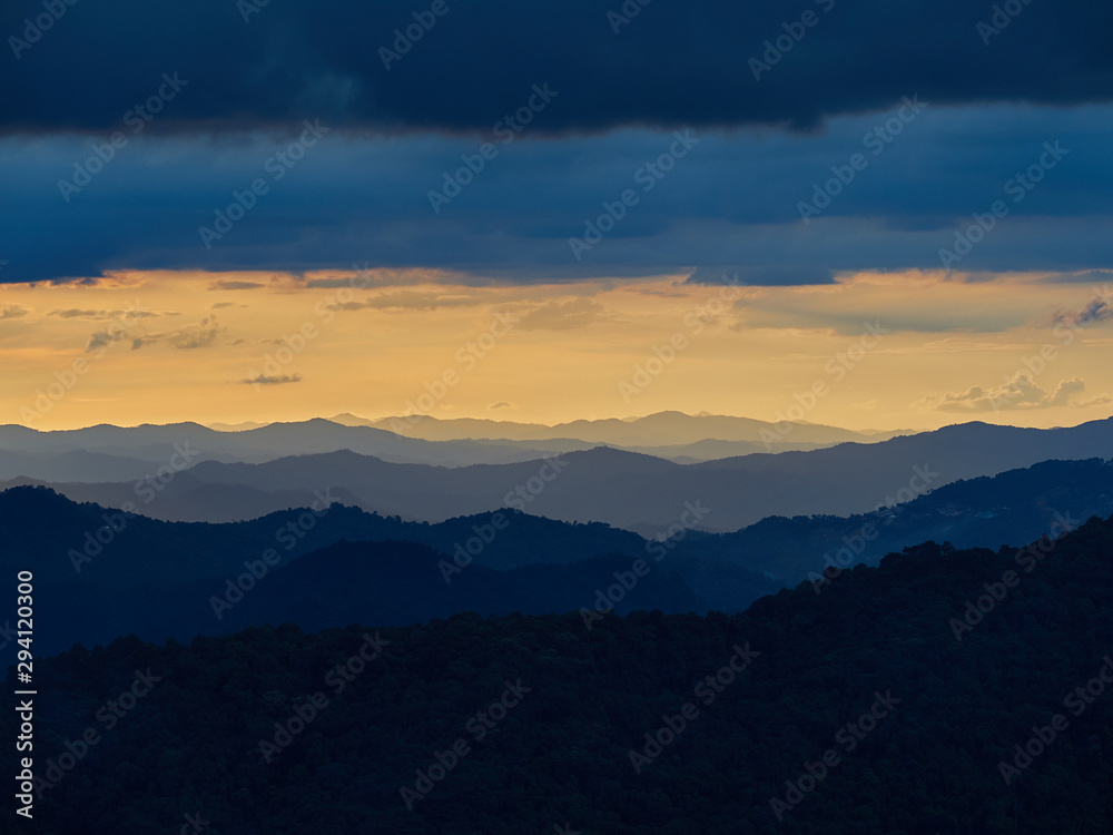 Layer of mountains and mist at sunset time, Landscape on Doi Pui viewpoint, Doi Suthep-Pui national park, Chiang Mai Province, Thailand.