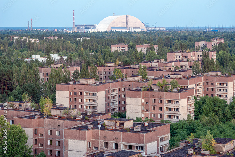 view of the new safe confinement arch at the Chernobyl nuclear power plant through the prospect of abandoned Pripyat. NSF is a new sarcophagus for safe deactivation work