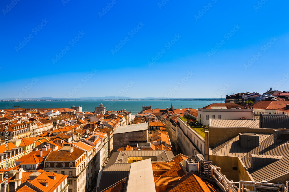 View from observation deck of the Elevador de Santa Justa to the old part of Lisbon. Cityscape with the Lisbon rooftops