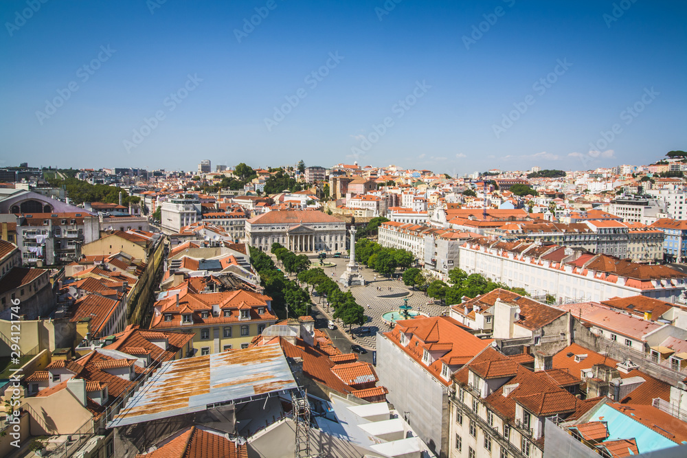 beautiful view from the roof of Santa Justa on Lisbon and the Queen Maria II National Theatre. Cityscape with the Lisbon rooftops