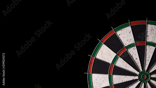 dartboard on a black background