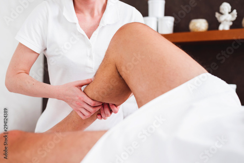 Konstfotografi Man enjoying sports massage at spa