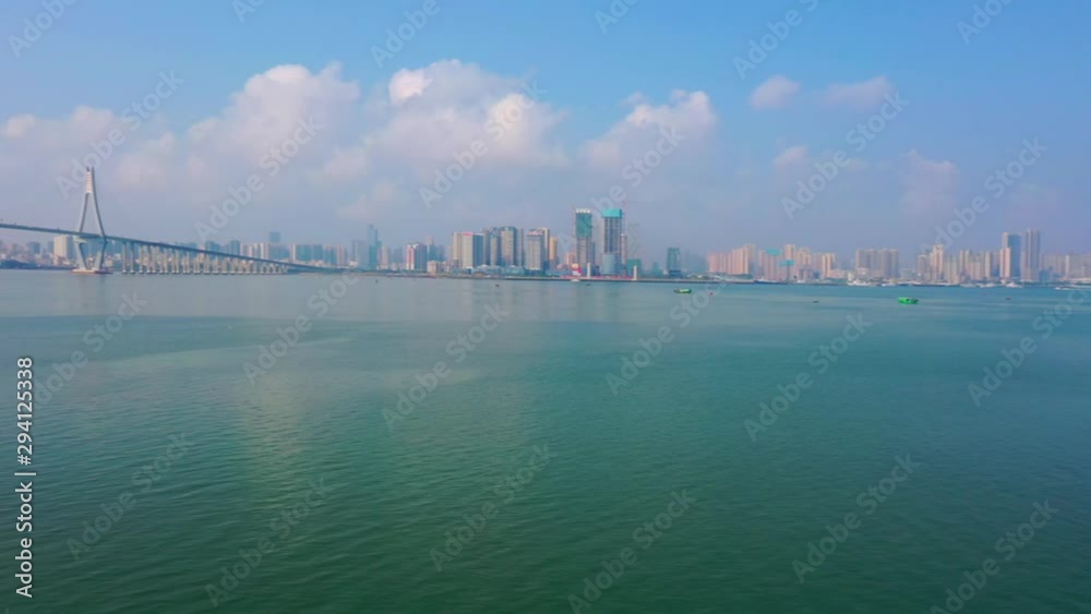 A seaside city view of Zhanjiang Bay, Guangdong, China A seaside city view of Zhanjiang Bay, Guangdong, China