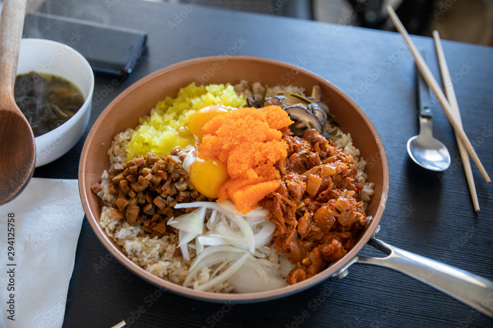 Fototapeta premium Korean rice with Tobiko egg, is orange (flying fish roe)