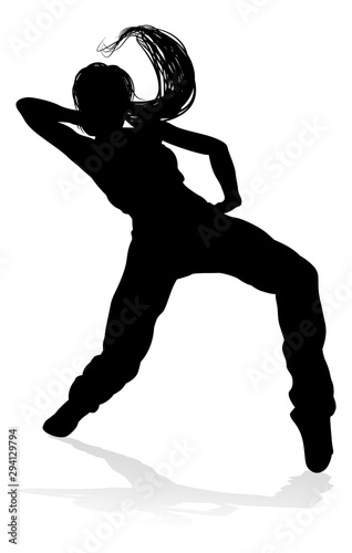 A woman street dance hip hop dancer in silhouette
