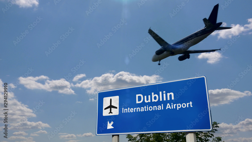 Fototapeta premium Plane landing in Dublin with signboard