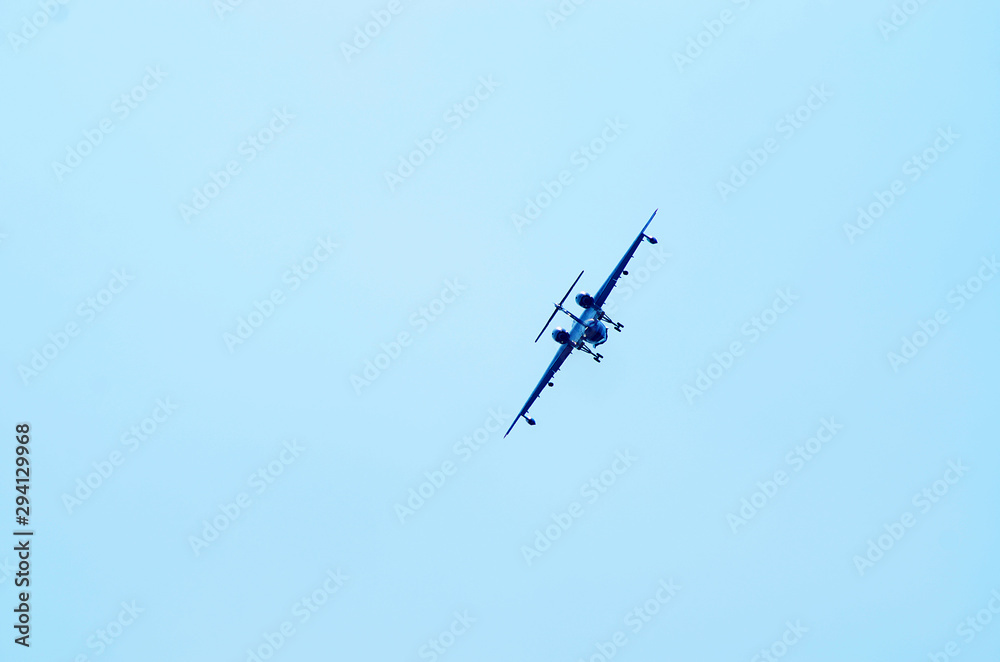 Aerobatics. Planes in the blue sky. Traces of aircraft in the sky. Drawings on the sky. Aerobatics. Planes in the blue sky. Traces of aircraft in the sky. Drawings on the sky.