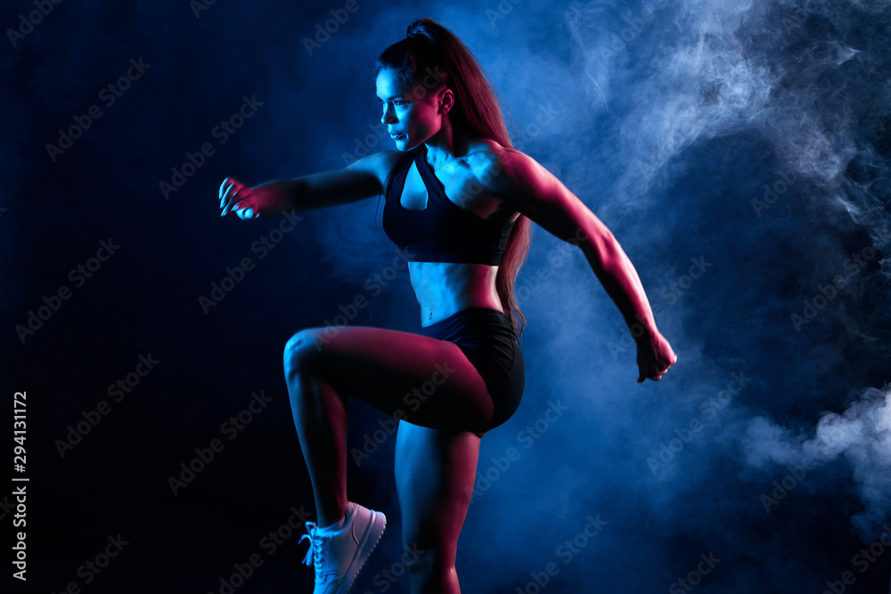 talented woman dancing in the night club, performance, entertainment. close up side view photo. isolated black background, studio shot