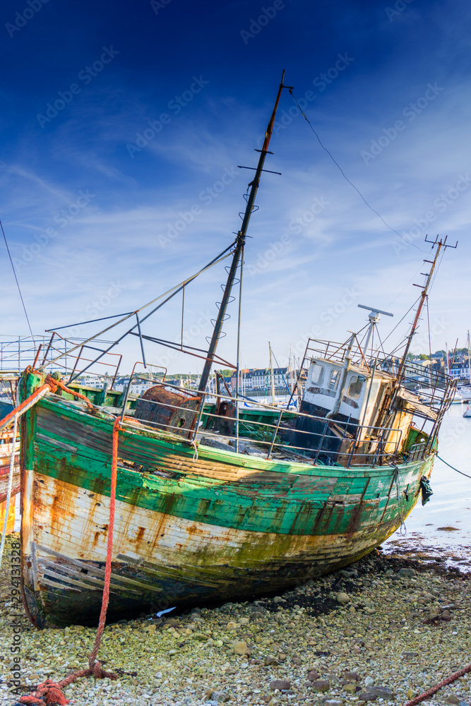 vertical view of old fishing boat wrecks in the ship cemetery of Camaret-Sur-Mer