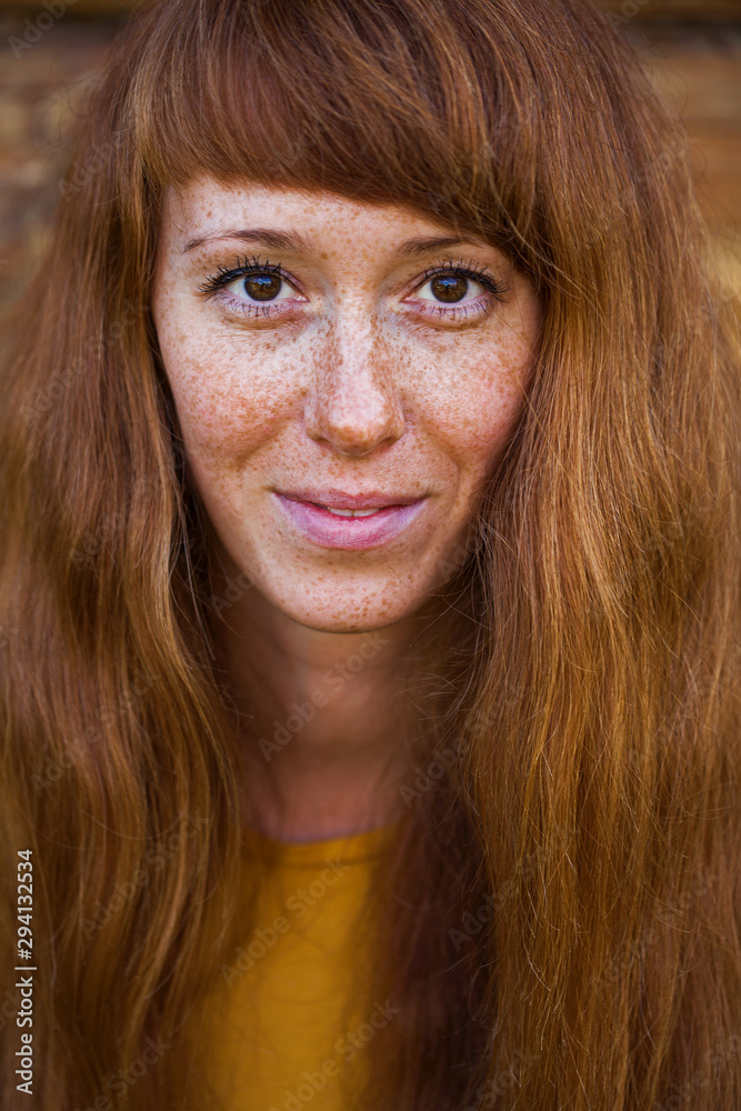 Portrait close up of young red-hair woman Portrait close up of young red-hair woman