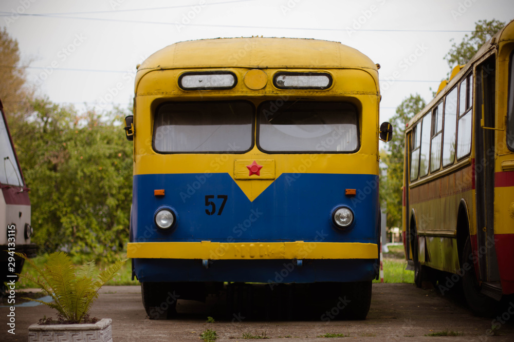 old bus blue with yellow