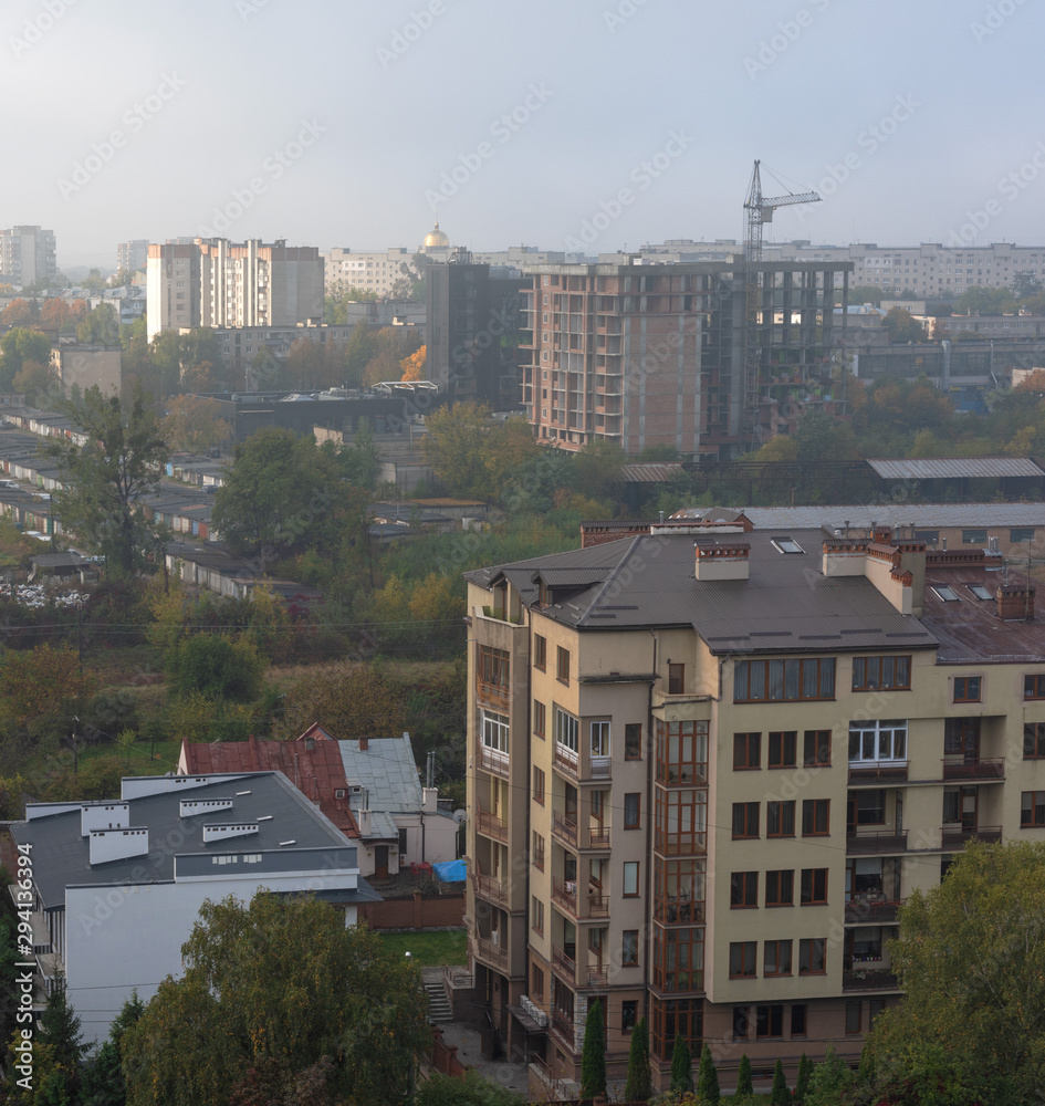 Construction of new residential buildings using high-rise cranes in large cities with beautiful landscapes around. Construction of new residential buildings using high-rise cranes in large cities with beautiful landscapes around.