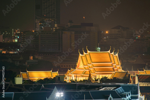 Wat Pho or Wat Phra Chetuphon Vimolmangklararm Rajwaramahaviharn at night in Bangkok, urban city, Thailand. Buddhist temple. photo