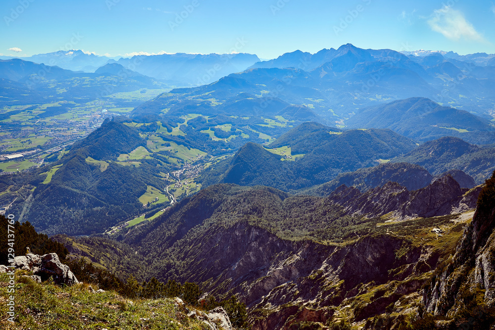 Mountain landscape in Austria, cloudy, forests, rocks, city in the mountains, summer Mountain landscape in Austria, cloudy, forests, rocks, city in the mountains, summer