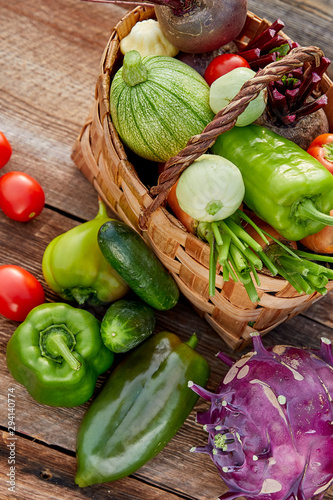 vegetables in the basket. vertical composition.
