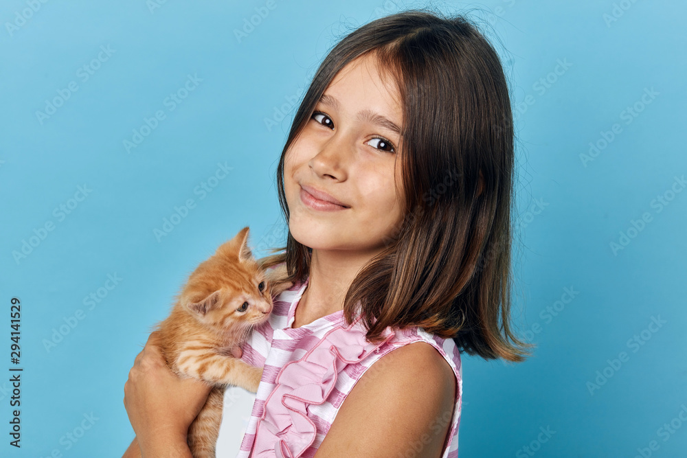 awesome cute brunette girl holding a pat in hands looking at the camera, close up portrait, studio shot, happiness, gift awesome cute brunette girl holding a pat in hands looking at the camera, close up portrait, studio shot, happiness, gift