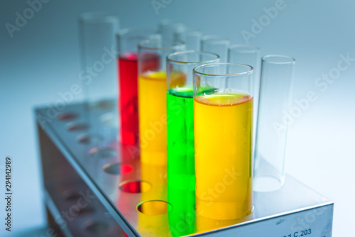 Science chemical tubes with colorful liquid. Medical laboratory research background. pharmacology and biotechnology concept. Copy space for texting. photo