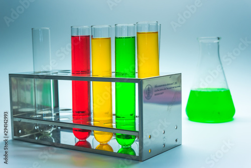 Science chemical tubes with colorful liquid. Medical laboratory research background. pharmacology and biotechnology concept. Copy space for texting. photo