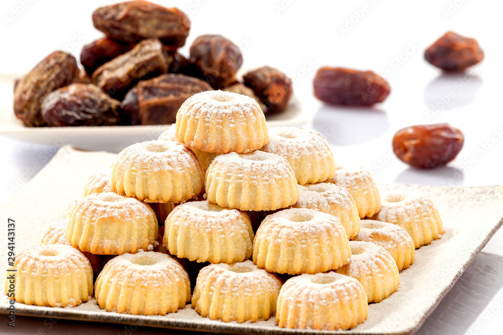 Mamoul with dates on white background 