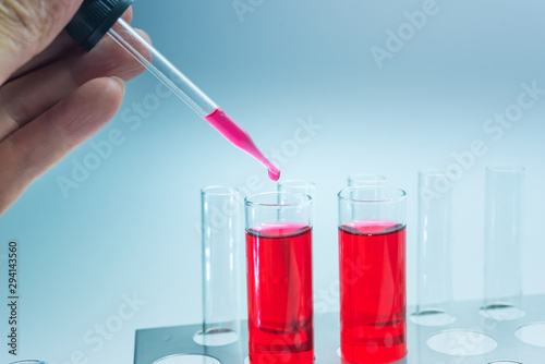 Science chemical tubes with colorful liquid. Medical laboratory research background. pharmacology and biotechnology concept. Copy space for texting.
