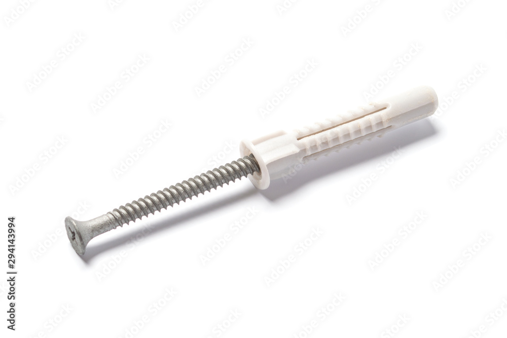 Plastic dowel and self-tapping screw on white background Plastic dowel and self-tapping screw on white background