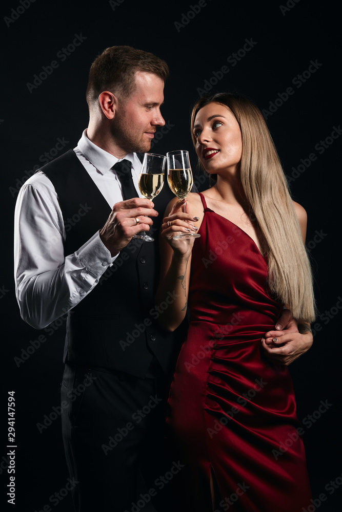 young happy woman and man celebrating New year holiday. celebration, festive time . pleasure concept young happy woman and man celebrating New year holiday. celebration, festive time . pleasure concept