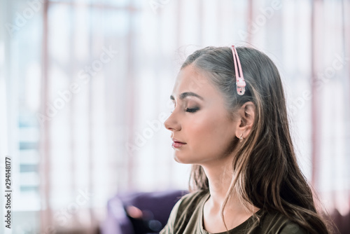 Free Download Attractive brunette model with closed eyes on make-up process - GFXLoad