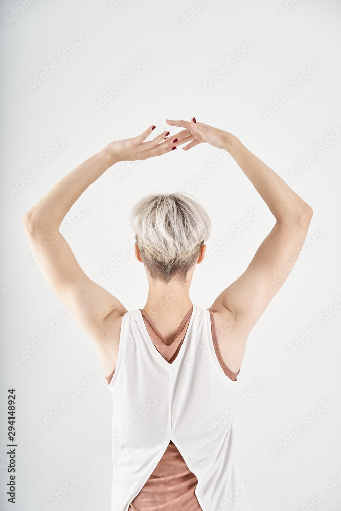 young woman in white dress yoga young woman in white dress yoga