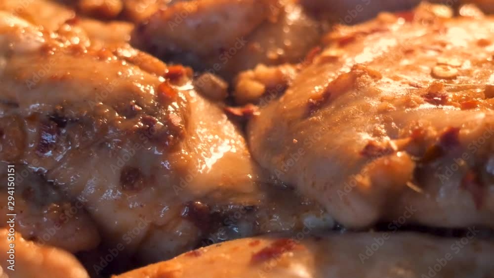 Cooking chicken wings in the oven.
