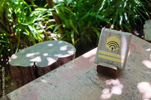 Free wifi concept with the wifi logo on the wood