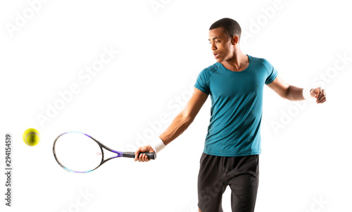 Afro American tennis player man over isolated white background .