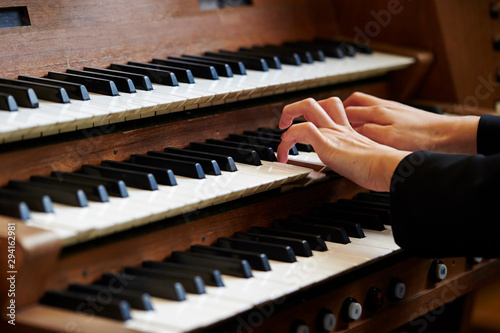 A woman playing the pipe organ  photo