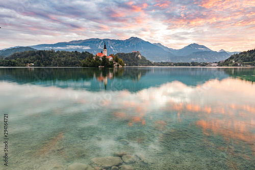 Beautiful Lake Bled in Slovenia and Church on Island. Romantic Sunrise. Travel Destination © marcin jucha