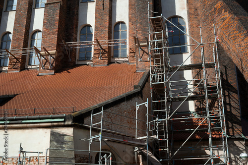 Reconstruction, renovation, restoration and conservation of old historical church, cathedrail and antique building. Scaffolding around the monument