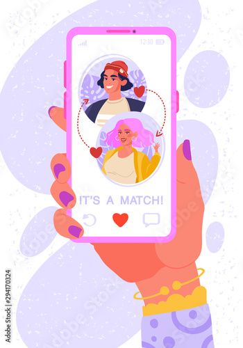  Online dating app concept on phone screen. Female hand with smartphone. Two young people liked each other. Their interest coincided. Now they can chat and go on date in real life, cause IT'S A MATCH.