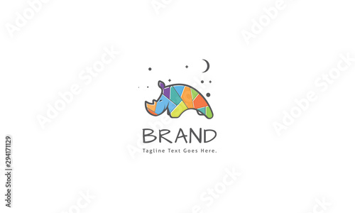 Vector logo on which an abstract image of a rhino cub with colored elements.