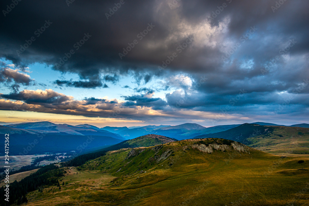 Landscape in the mountains at the sunset, Transalpina road in Carpathian Mountains, Romania Landscape in the mountains at the sunset, Transalpina road in Carpathian Mountains, Romania