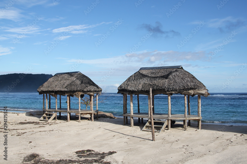 Beach fale, a simple open 'hut' (faleo'o Samoan language), popular in budget eco-tourism in Samoa. Beautiful day fale at Lalomanu Beach