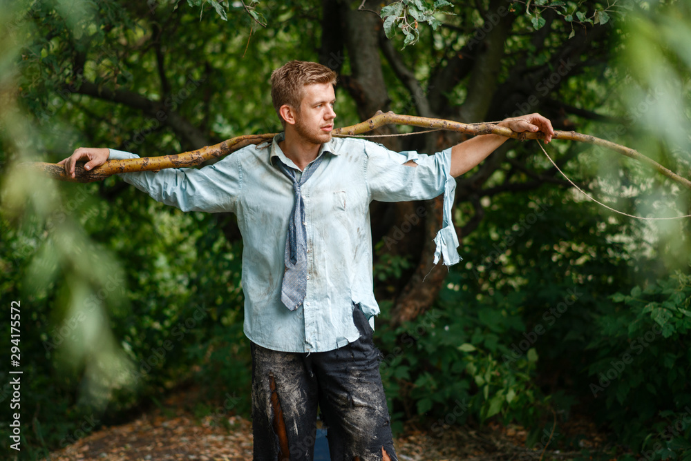Businessman with homemade fishing rod, lost island Businessman with homemade fishing rod, lost island