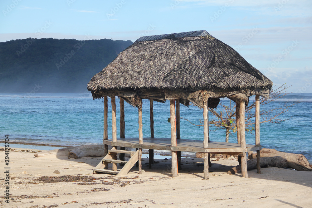 Beach fale, a simple open 'hut' (faleo'o Samoan language), popular in budget eco-tourism in Samoa. Beautiful day fale at Lalomanu Beach