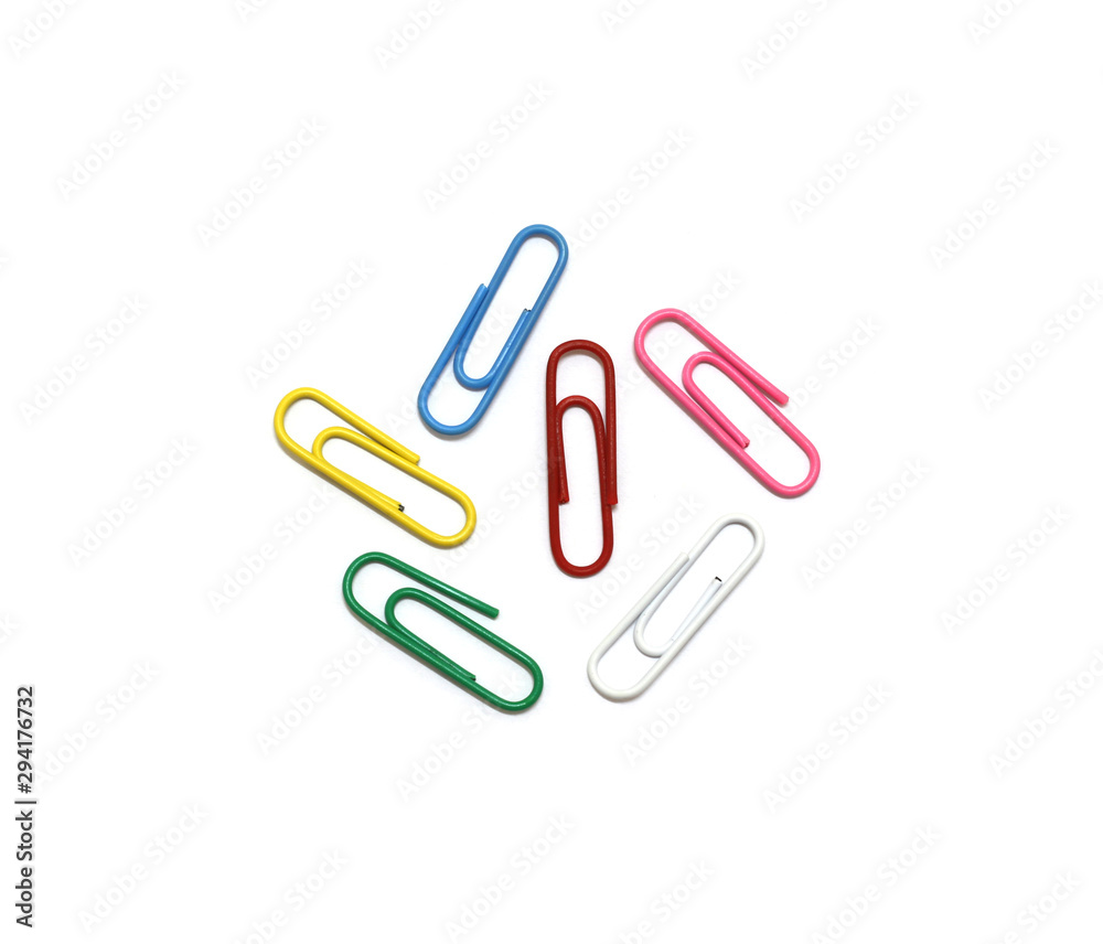 Colored paper clips on white background Colored paper clips on white background