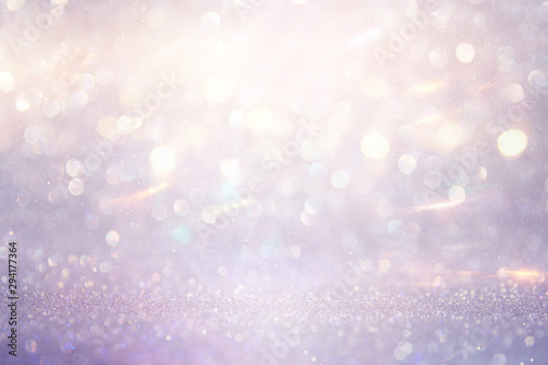 abstract glitter pink, purple and gold lights background. de-focused © tomertu