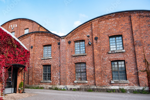 Old brick wall. Factory and architecture of the 20th century.